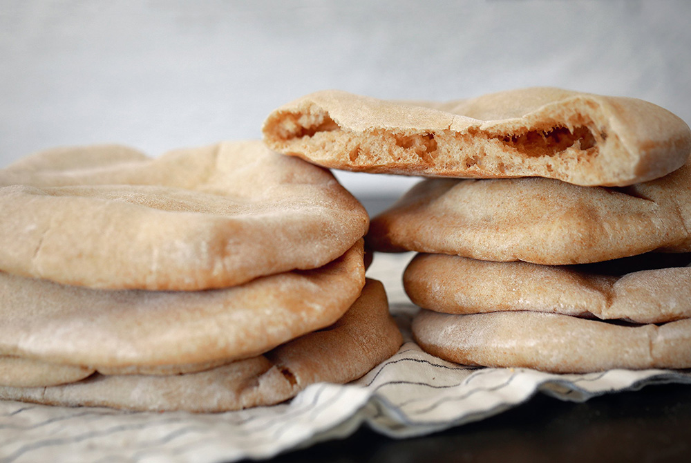 A leavened flatbread akin to pita has been made in the Middle East since before the time of Christ. (CNS/Nancy Wiechec) A leavened flatbread akin to pita has been made in the Middle East since before the time of Christ. (CNS/Nancy Wiechec)